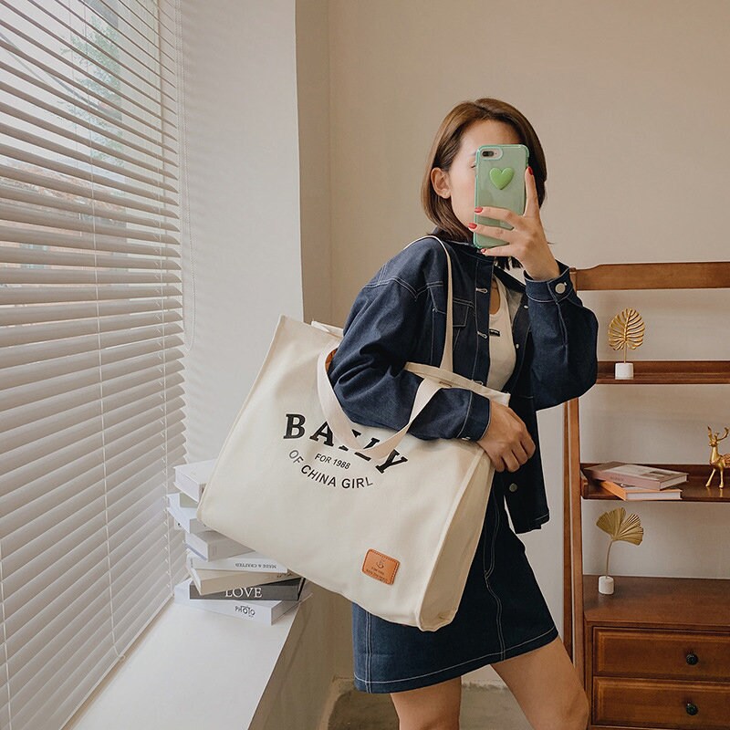 Thickened canvas bag Customized LOGO Handbag Simple eco-friendly shopping bag Large canvas bag Travel one-shoulder bag