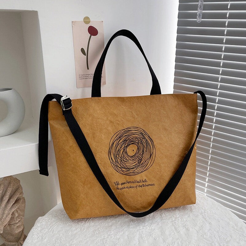 High-grade rubberized Dupont Paper Kraft Paper Bag Customized Tooth Bag Mass Handheld Personality Original Bag