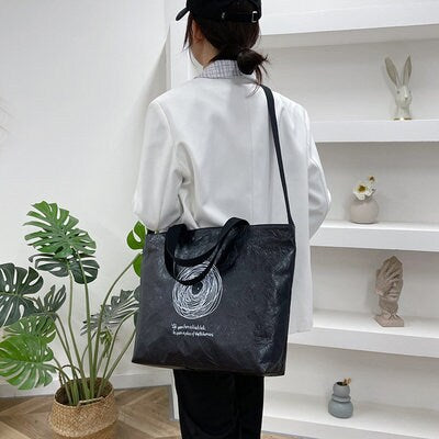 High-grade rubberized Dupont Paper Kraft Paper Bag Customized Tooth Bag Mass Handheld Personality Original Bag