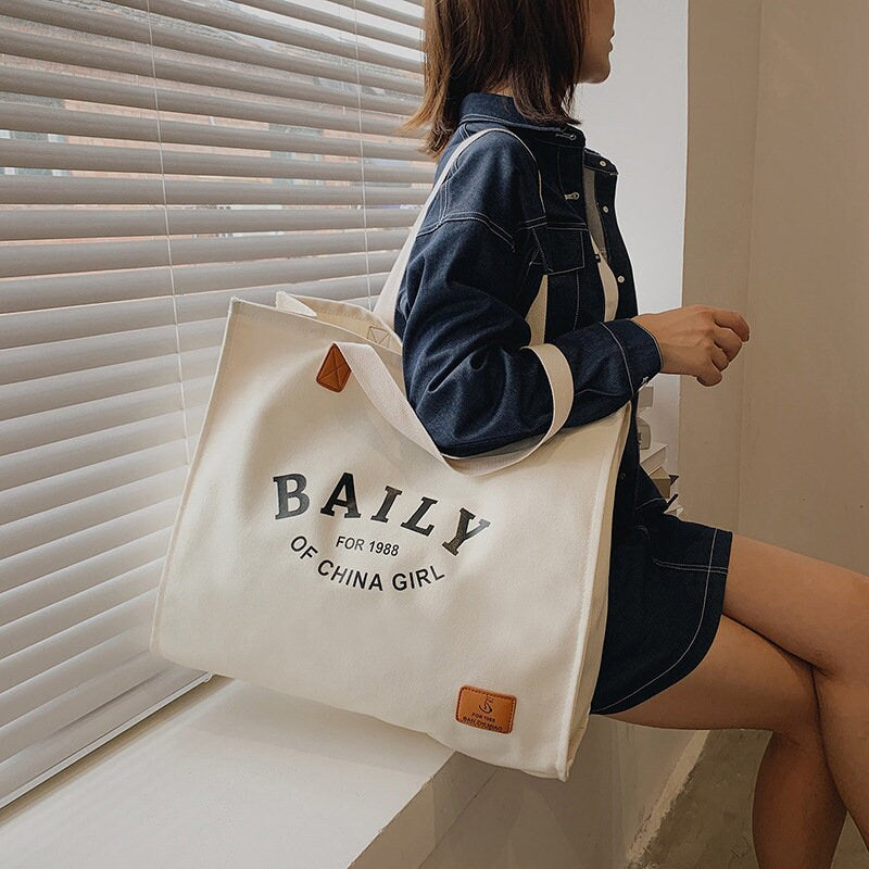 Thickened canvas bag Customized LOGO Handbag Simple eco-friendly shopping bag Large canvas bag Travel one-shoulder bag