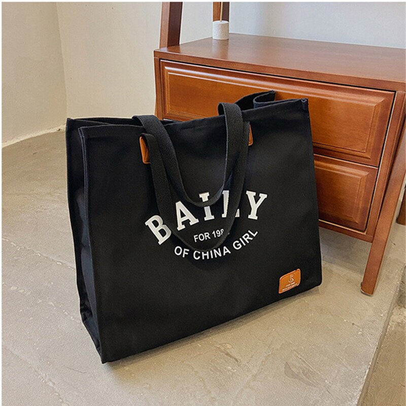 Thickened canvas bag Customized LOGO Handbag Simple eco-friendly shopping bag Large canvas bag Travel one-shoulder bag